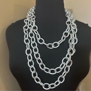 Light weight multi strand silver plastic chain